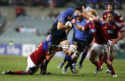 Western Force lock Nathan Sharpe carries the ball in to the Highlanders defence