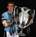 Leicester's Tom Croft poses with the Guinness Premiership trophy