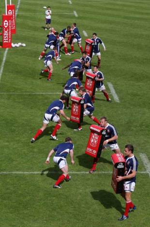 The Lions engage in a tackling drill during their first training session at Pennyhill Park Hotel in Bagshot, Surrey, May 19, 2009