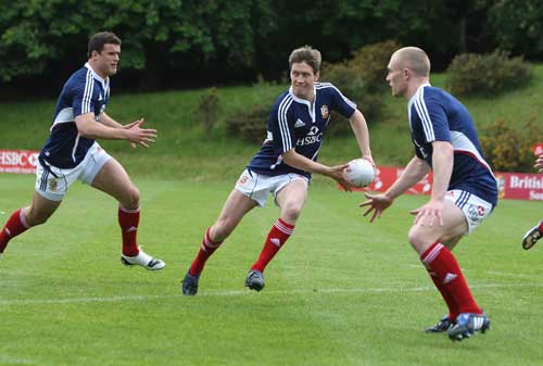 British and Irish Lions fly-half Ronan O'Gara passes the ball