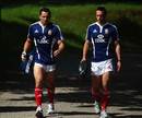 British and Irish Lions Riki Flutey and Mike Blair walk to training