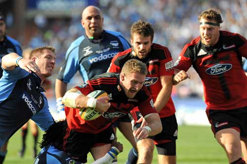 The Crusaders' Kieran Read stretches to score a try