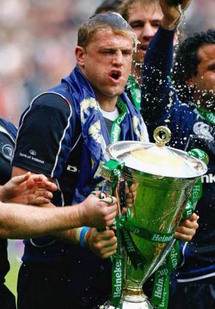 Leinster's Jamie Heaslip celebrates with the Heineken Cup