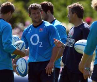 England's Tom May listens to instructions during training at Pennyhill Park Hotel in Bagshot, Surrey, June 3, 2009