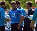 England's Tom May listens to instructions