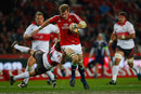 British & Irish Lions forward Tom Croft bursts through a tackle