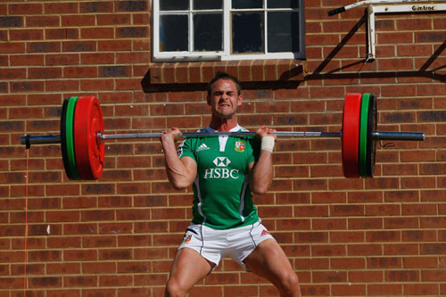British & Irish Lions full-back Lee Byrne lifts weights at St David's college 