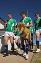 British & Irish Lions back Leigh Halfpenny carries the mascot at St. David's School 