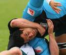 Australia flanker George Smith grapples with a team-mate during training