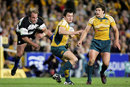 The Barbarian's Phil Waugh attempts a tackle on Australia's Adam Ashley-Cooper