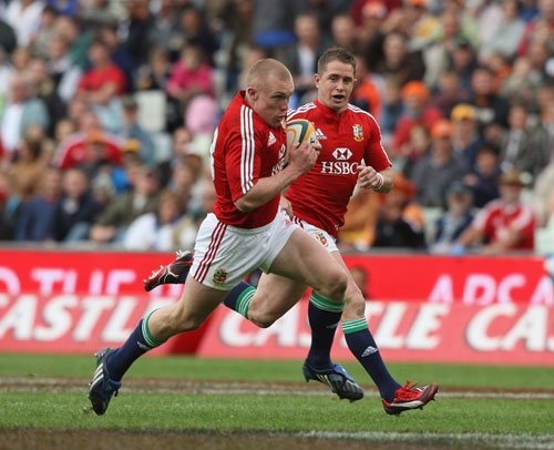 British & Irish Lions' centre Keith Earls scores a try against the Cheetahs