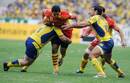 Perpignan's Julien Candelon powers in to the Clermont defence
