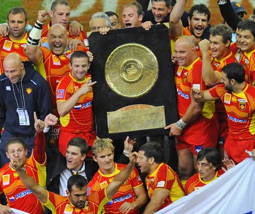 Perpignan celebrate with the Bouclier de Brennus following their victory in the Top 14 Final