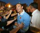 Perpignan's Dan Carter is mobbed by fans following his side's Top 14 Final victory