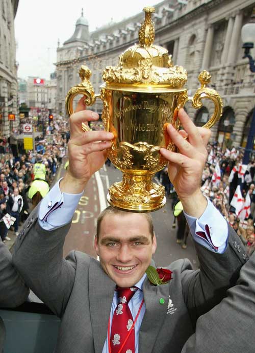 Trevor Woodman holds the Rugby World Cup during the England victory parade