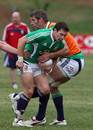 British & Irish Lions flanker David Wallace is tackled by Simon Shaw