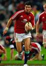 Lions scrum-half Mike Phillips exploits a gap in the Sharks' defence