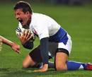 France's Francois Trinh-Duc celebrates scoring a try against New Zealand during their clash at Carisbrook