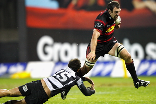 George Whitelock steps out of a tackle on the way to scoring the bonus point try