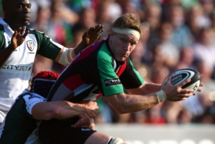 Jim Evans of Harlequins is tackled during the Guinness Premiership game between Harlequins and London Irish at the Twickenham Stoop on September 27, 2008 in London, England.