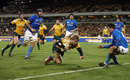 Australia's James O'Connor scores a try In the First Test against Italy