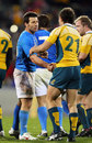 Australian Rugby League exile Craig Gower of Italy shakes hands with Australia's Quade Cooper 