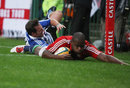 British & Irish LIons wing Ugo Monye dives over to score the Lions' second try against Western Province