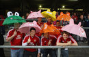 British & Irish Lions fans take cover against Western Province