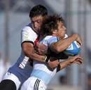 Argentina wing Gonzalo Camacho is tackled by Matt Banahan