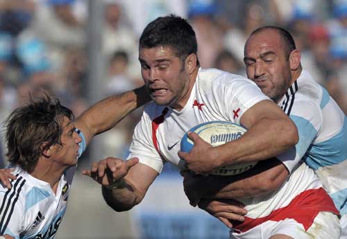 England No.8 Nick Easter crashes in to the Argentina defence