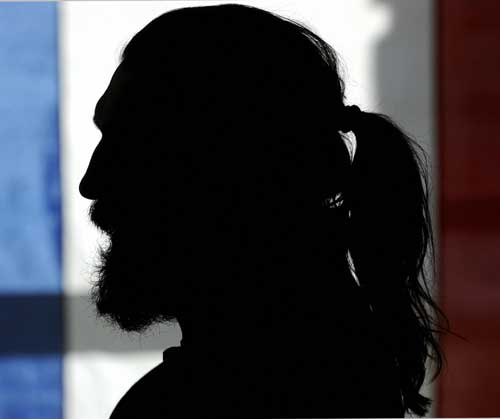 France lock Sebastien Chabal is silhouetted during a press conference in Wellington