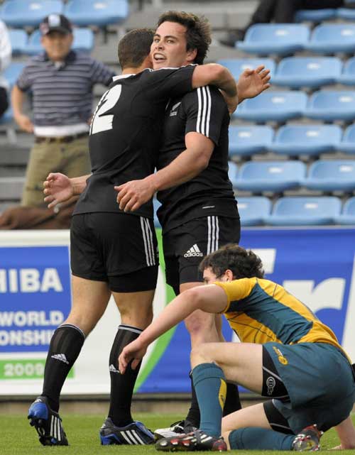 New Zealand Under-20 wing Zac Guildford is congratulated after scoring