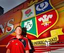 Lions fly-half Ronan O'Gara stands in front of the tourists' team bus