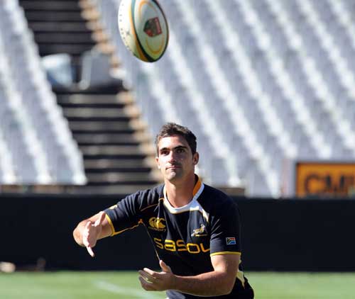 South Africa fly-half Ruan Pienaar waits to catch the ball during training