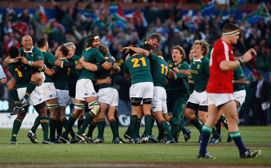 Morne Steyn is mobbed by his team-mates after kicking the winning penalty to beat the Lions in Pretoria