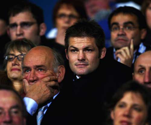 All Blacks skipper Richie McCaw watches from the stands as his side take on France
