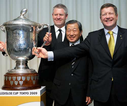 Steve Tew, Nobby Mashimo and Matt Carroll pose with the Bledisloe Cup