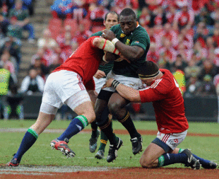 South Africa prop Tendai Mtawarira is tackled by Phil Vickery and Andrew Sheridan of the British & Irish Lions, South Africa v British & Irish Lions, third Test, Ellis Park, Johannesburg, July 4, 2009 