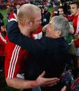 Lions head coach Ian McGeechan embraces his skipper Paul O'Connell