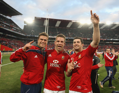 Lions players Jamie Roberts, Joe Worsley and Rob Kearney celebrate after the match