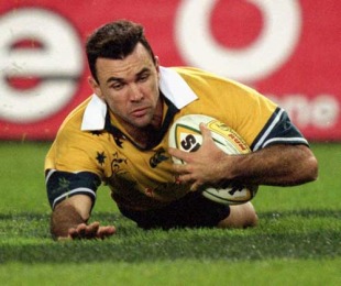 Australia's Joe Roff slides in to score a try, Australia v British & Irish Lions, Colonial Stadium, Melbourne, Australia, July 7, 2001