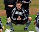 All Blacks skipper Richie McCaw stretches during a training session