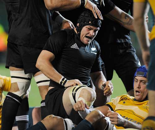 New Zealand skipper Richie McCaw is congratulated after scoring