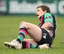 Harlequins' Tom Williams goes to ground with an injury