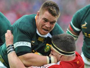 South Africa's John Smit is tackled by the Lions' Andrew Sheridan, South Africa v British & Irish Lions, Ellis Park, Johannesburg, South Africa, July 4, 2009