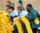 Springboks Tendai Mtawarira, Jannie du Plessis and Ryan Kankowski hold tackle bags