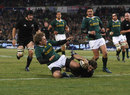 Conrad Smith dives over for the All Blacks to score against the Springboks