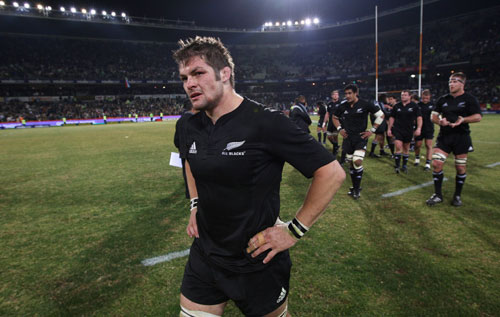 Richie McCaw leads the All Blacks off the field after their loss to the Springboks in Bloemfontein