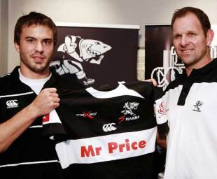Pumas fly-half Juan Martin Hernandez poses with Sharks coach John Plumtree after his unveiling at Kings Park, Durban, South Africa, July, 28, 2009
