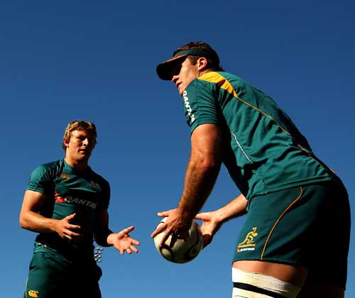 Lachlan Turner and James Horwill of the Wallabies practice a skills drill during an Australian Wallabies training session